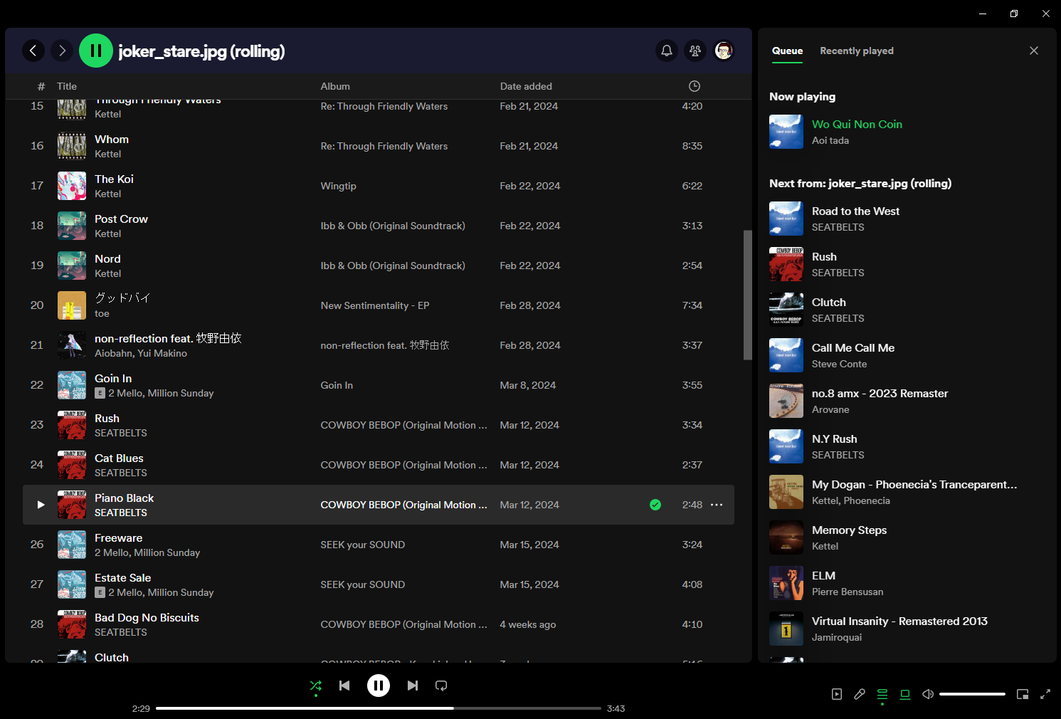 screenshot of my Spotify playlist with the queue open